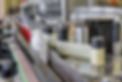 Automatic line for filling and labeling drugs. The mechanism for gluing labels..jpg