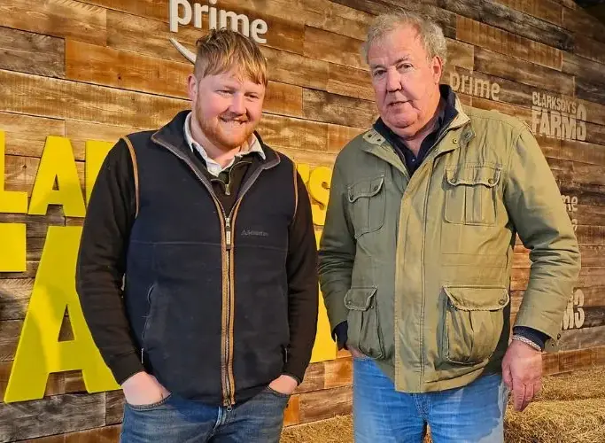 Kaleb Cooper and Jeremy Clarkson in front of Amazon Prime Clarkson’s Farm - based in the near Beyonce and Jay-Z Cotswolds Wiggington
