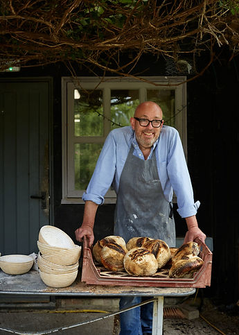 The founder and current owner of Worton Kitchen Garden is Simon Spence, a former _City boy
