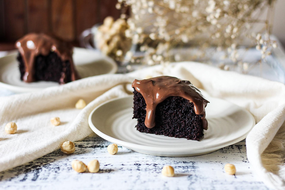 Eggless chocolate cake served with chocolate ganache