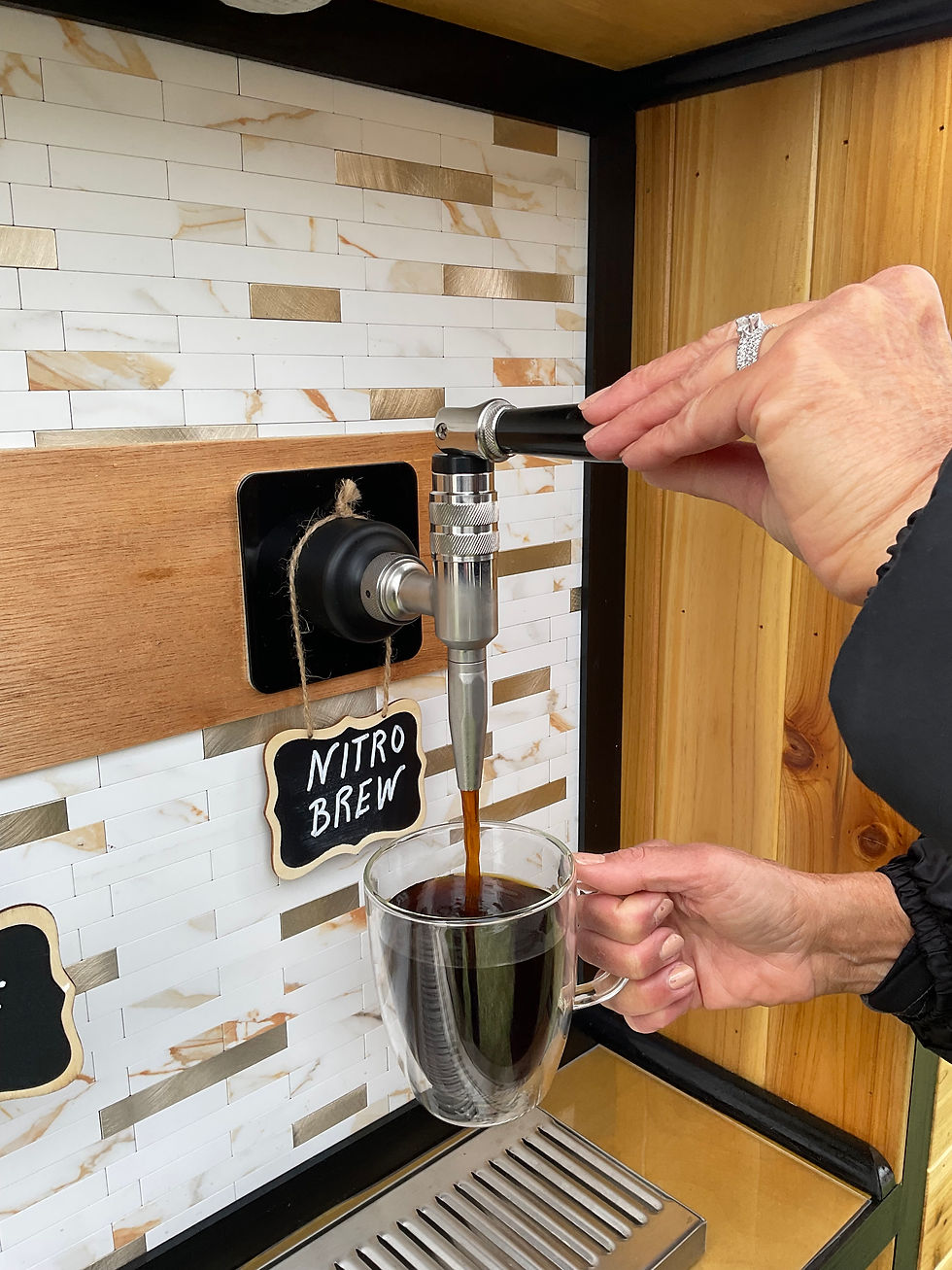 Professional mobile bar service pouring draft beverages at a corporate event