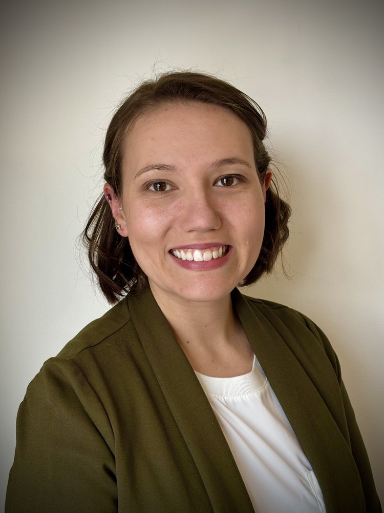 Headshot of Dr. Allyson Dennin, licensed clinical psychologist offering telepsychology for trauma, anxiety, ADHD, and family therapy