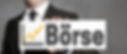 boerse-german-stock-market-sign-held-businessman-91671542_edited.jpg