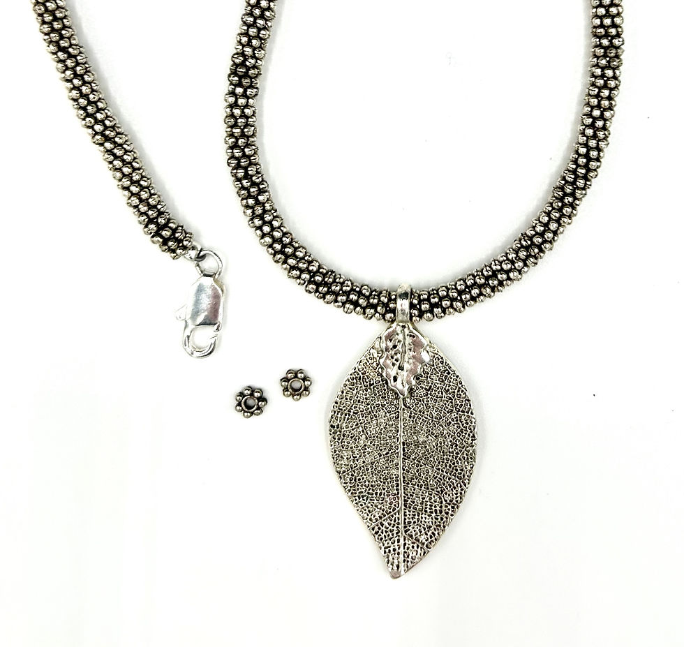 Thumbnail: silver plated leaf, beaded chain, with bead detail 