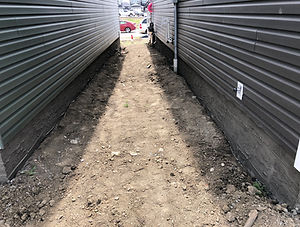 Professional parging installation around residential foundation in Edmonton