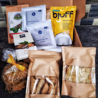 ExplorIn Box September 2021 theme named Kaapi Time with box open and showing all the 8 unique authentic Indian snacks sourced directly from the artisans running business from centuries