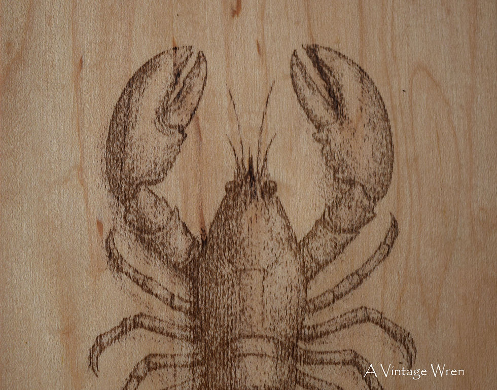 Thumbnail: rustic wood lobster sign with a red background and engraved lobster on light colored wood