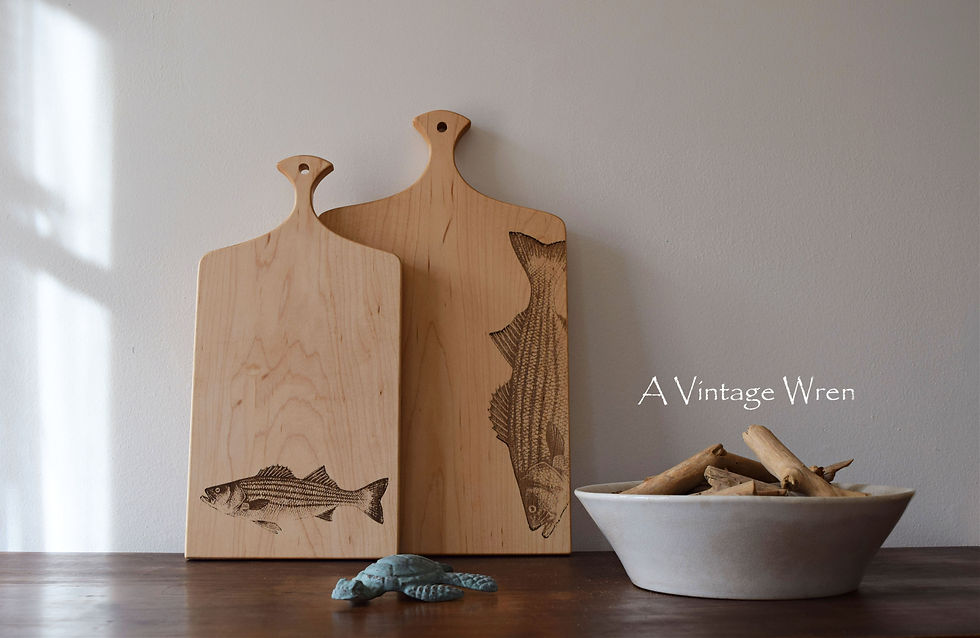 Solid Maple charcuterie board with an engraved fish on the front