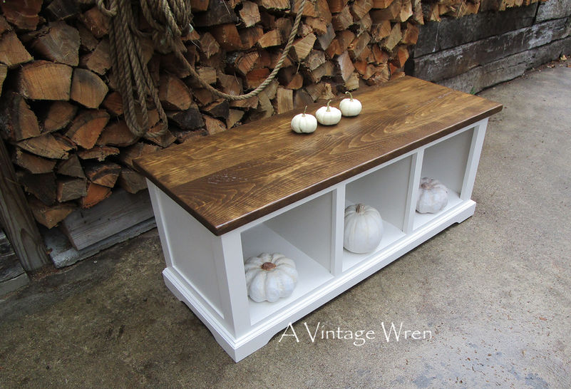 Add warmth and organization to your home with this beautiful farmhouse entryway storage bench. Featuring a dark stained solid wood top and a clean white painted base with 3 spacious open cubbies, it’s the perfect combination of rustic charm and mudroom functionality.