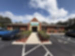 Brick exterior and school sign over the front entrance at Explorations Child Care, Oviedo, FL