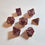Thumbnail: Brass Purple Metal Dice Set
