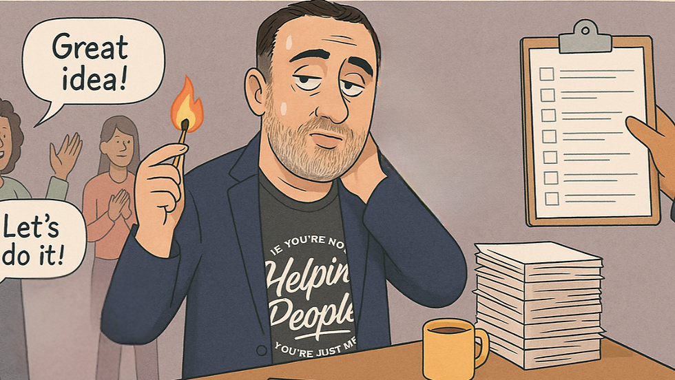 Cartoon illustration of a stressed, tired Stephan Bajaio rubbing his neck at a desk. He holds a single lit match next to a massive stack of paperwork and a yellow coffee mug. A hand points a blank checklist clipboard at him while colleagues cheer in the background with speech bubbles reading "Great idea!" and "Let's do it!" His t-shirt reads, "If you're not helping people, you're just me."