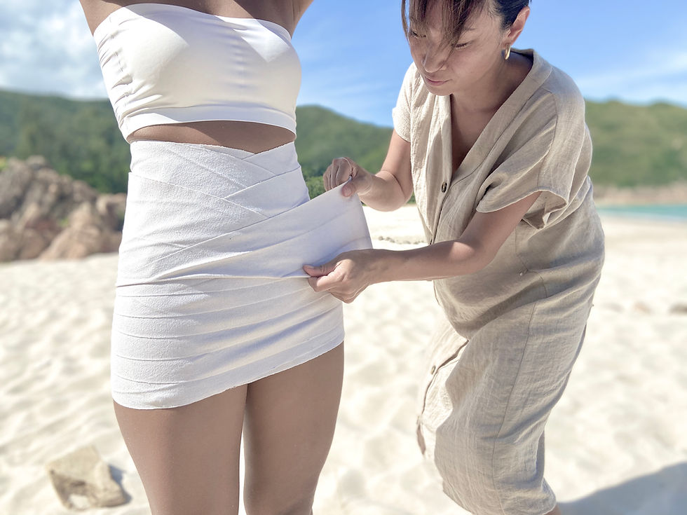 Belly Binding on the beach