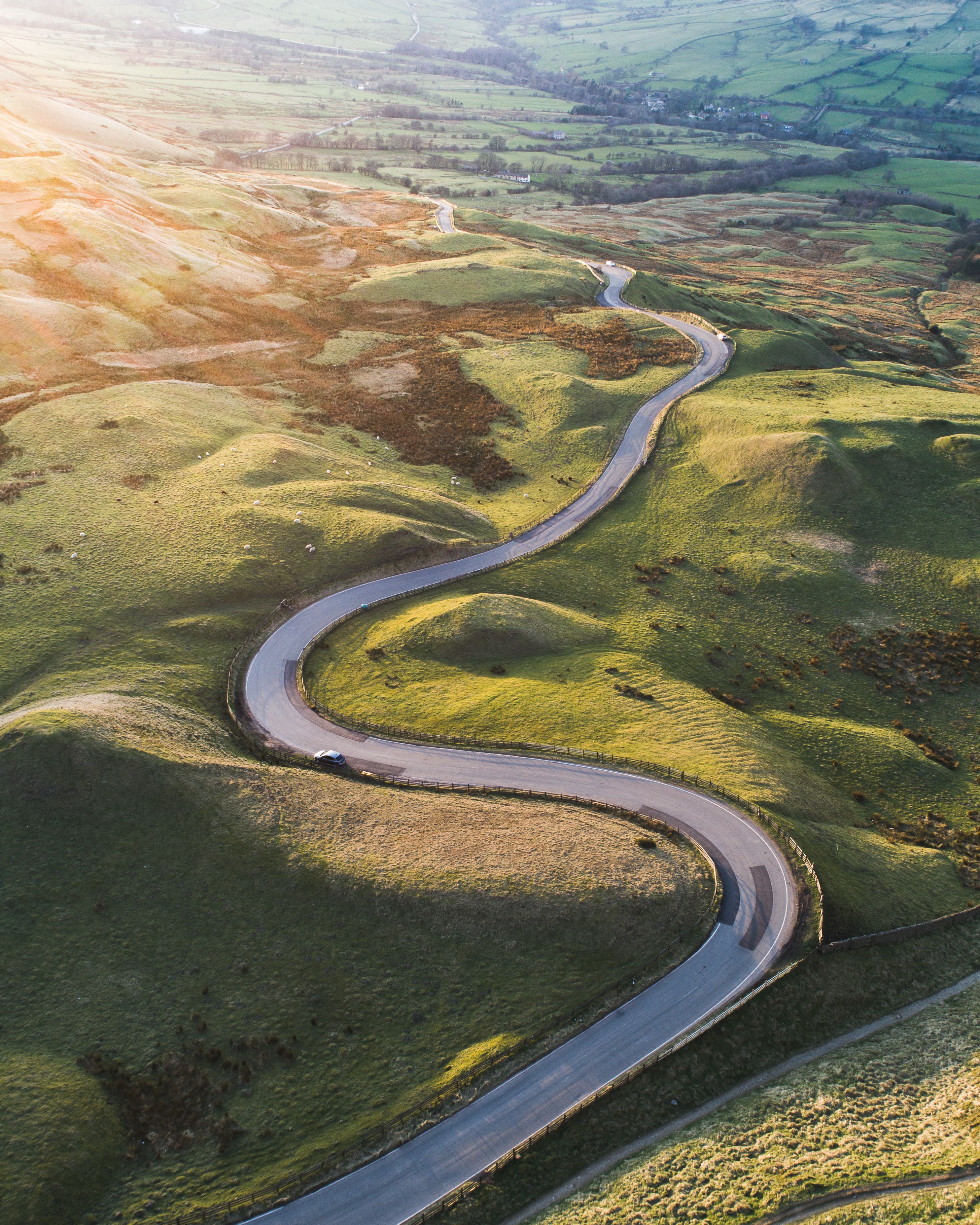 a-view-from-above-on-the-winding-road-with-mountai-2026-03-18-13-15-08-utc.jpg