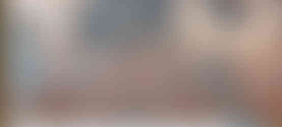 My finished Good Life Quilt close-up of the backing showing a beige flowery fabric.