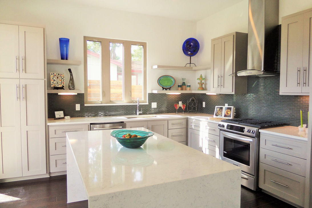 Waterfall counter top modern kitchen.