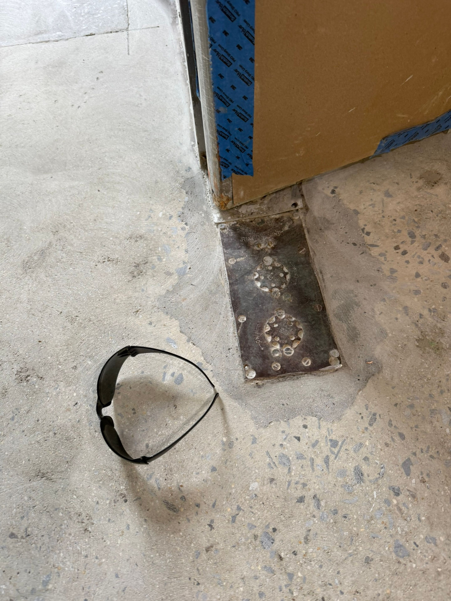 Concrete floor repair completed before commercial epoxy flooring installation