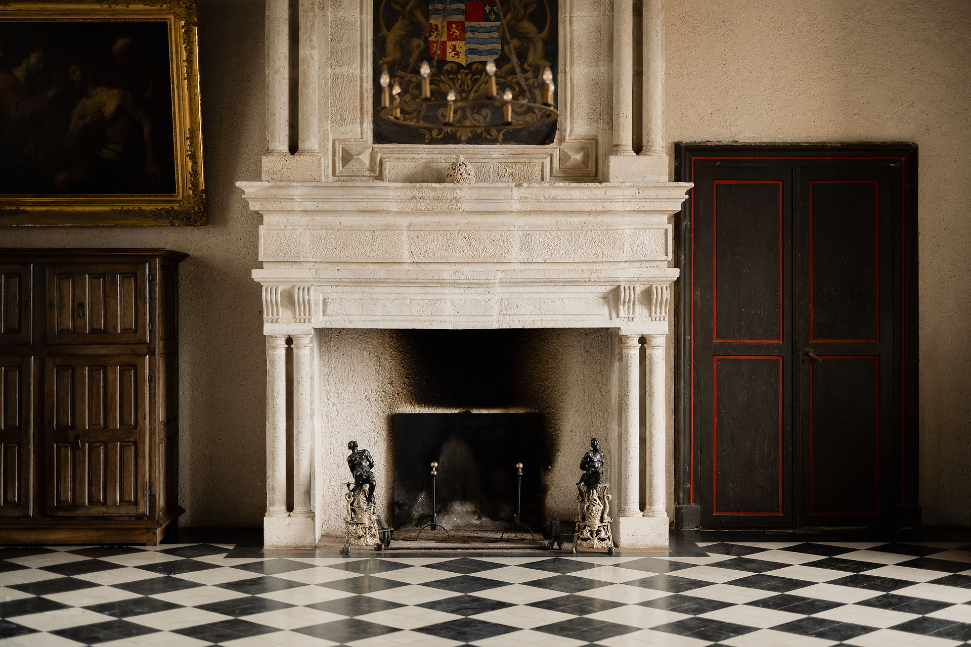 The fireplace in the guard room of Poudenas Castle