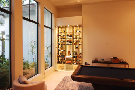 spider shape wine rack, gold metal, embedded RGB LEDs, wine tasting counter, acrylic glass-holder, integrated humidor, wooden bottom cabinet, glass shelves, wine wall, wine room, wine cellar, glass shelves, exclusive wine racks