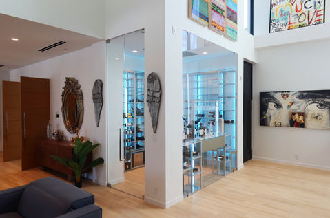 modern wine room Boca Raton Florida, contemporary wine storage, glass wine room, premium wine racks, luxury residential wine display, Dragon Cellars