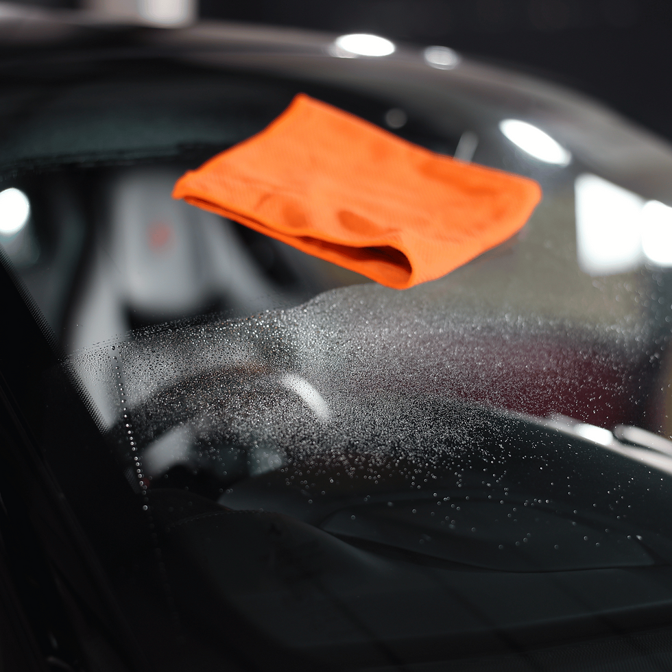 Orange microfibre glass cloth on windscreen