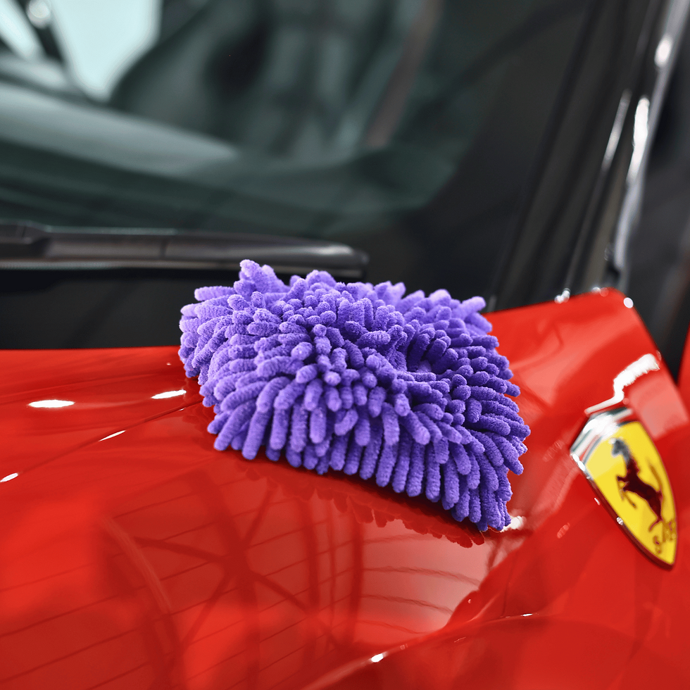 Purple wheel mitt on car