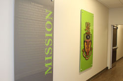 Displayed as a large-scale framed vinyl wall graphic, Life University’s mission statement takes cent