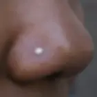 NOSTRIL PIERCING AT THE BLACK ROSE STUDIO MANSFIELD TX.webp