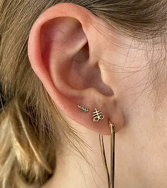 LOBE PIERCING AT THE BLACK ROSE STUDIO MANSFIELD, TX.webp