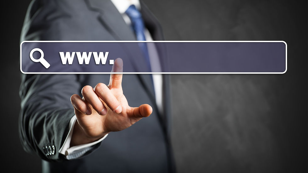 A man wearing a suit touching a domain name button with his index finger