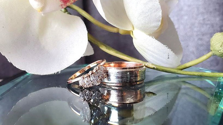 Rose gold 5 stone marquise diamond band and Rose gold band with Mokume Gane inlay. Created by Katherine Spencer in Morgantown, West Virginia, USA