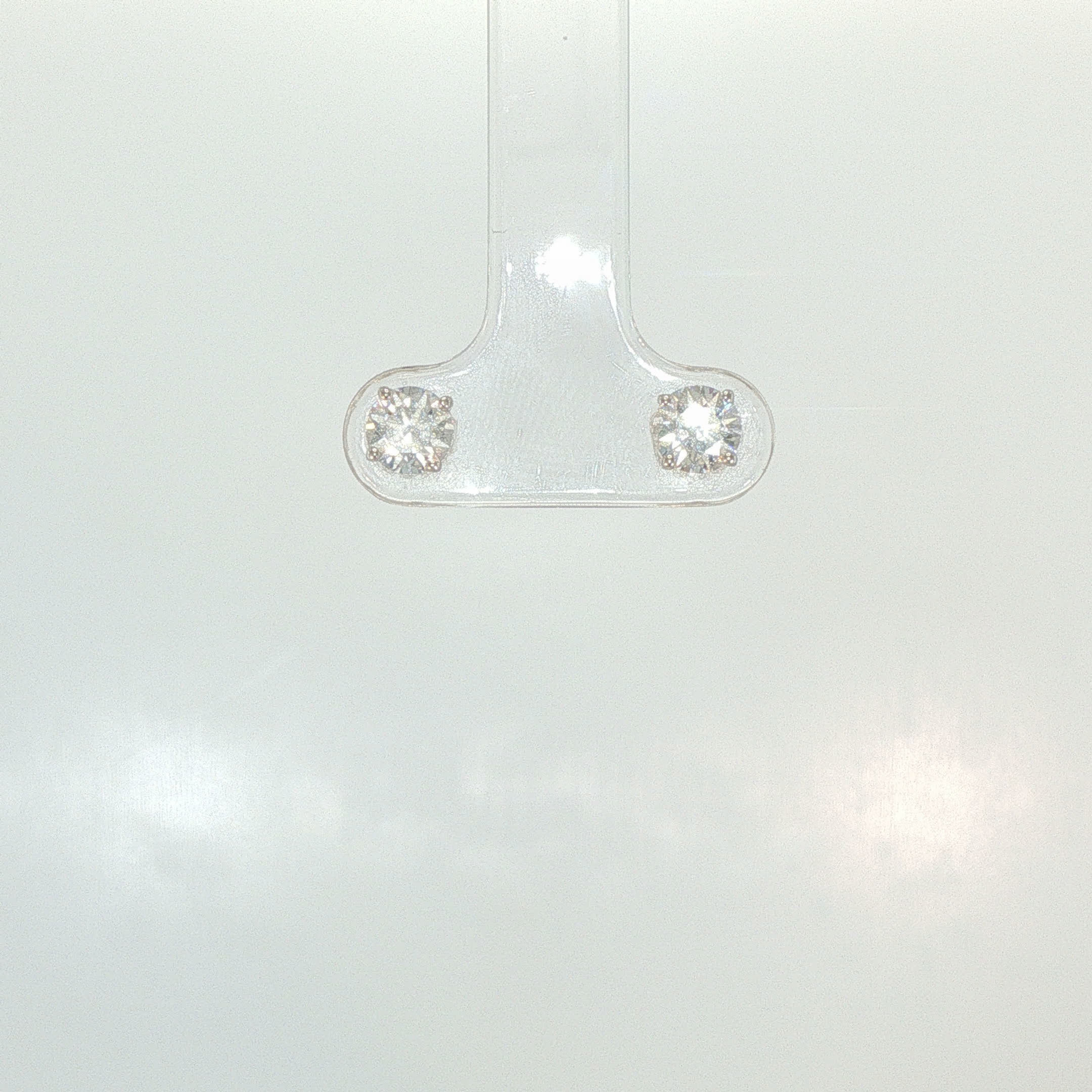 Round Cubic Zirconia Stud Earrings in White Gold