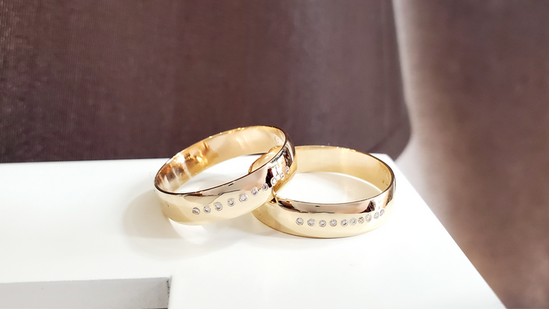 Matching men's Wedding Band Set in 10k yellow gold with 10 Diamonds each. Created by Katherine Spencer in Morgantown, West Virginia, USA