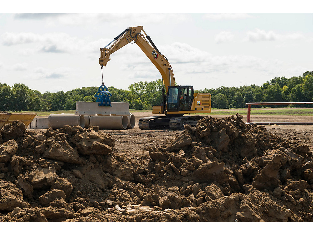 CAT 320 excavator working on a real jobsite