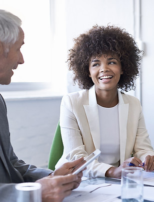 Executive Placement Smiling at Meeting