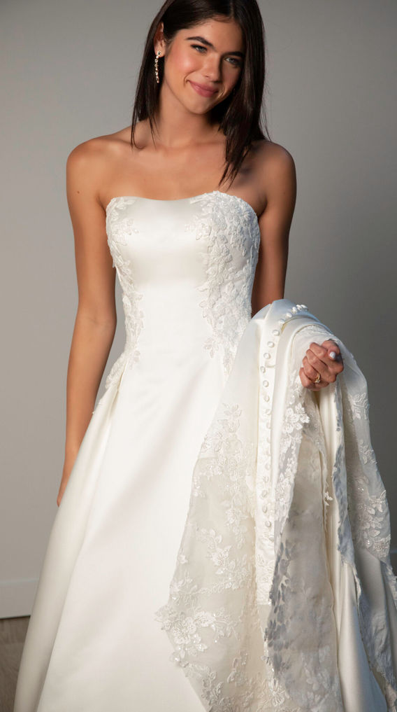Strapless Lace and Grand Satin A-Line Wedding Gown, Scalloped Cutout Train. Stella York Style SY8279, Grand Satin, lace, strapless bodice, lace appliqués, beading, zip back, fabric-covered buttons, lace cutout train