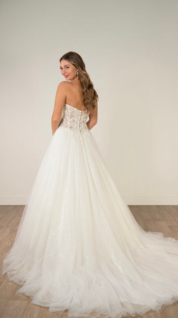 Strapless Sparkle Tulle and Lace Ballgown with Sheer Corset Bodice, strapless sweetheart neckline, structured bodice, visible corset boning, delicate floral lace appliqués, voluminous ballgown skirt, glitter tulle, zip back, buttons, train, stella york wedding dress, style SY8301