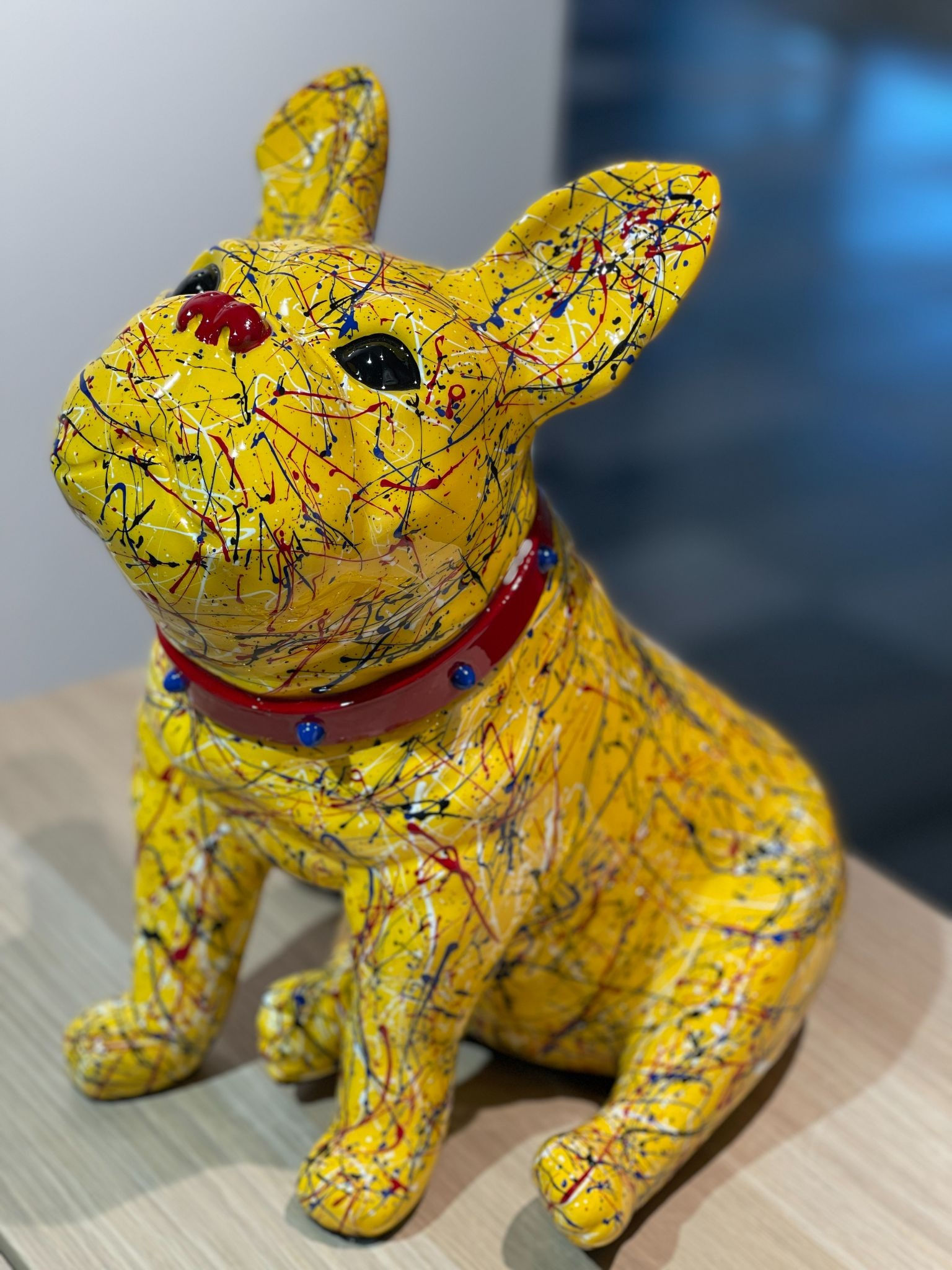 Sitting Frenchie pop art artwork in yellow splashing from Ancizar Marin for sale at Miva Fine Art Gallery Sweden