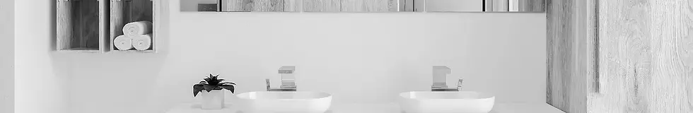 Minimalist bathroom in a Naples vacation rental, featuring dual white sinks, modern fixtures, and neatly arranged towels—showcasing luxury vacation rental amenities in South Florida.
