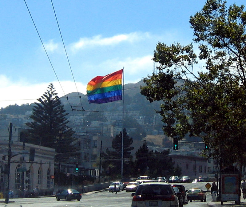 Gay Pride Flag above Harvey Milk Plaza in the Castro Neiborhood. Photo from Wikipedia.