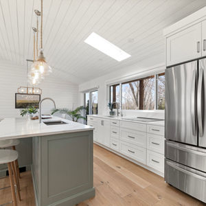 Beautifiul custom kitchen.
We vaulted the low ceiling for added ambiance and volume.
We added skylights to bring in natural light.