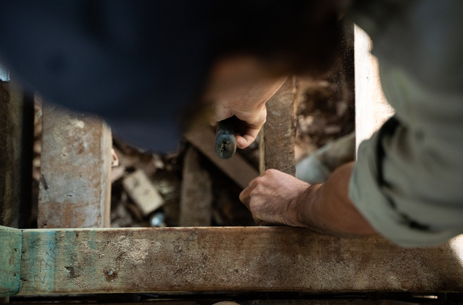 Carpenter driving joist nails