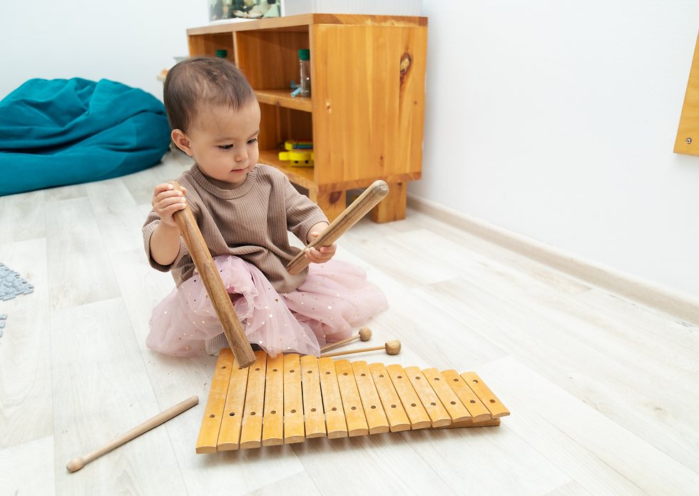 Toddler playing instruments