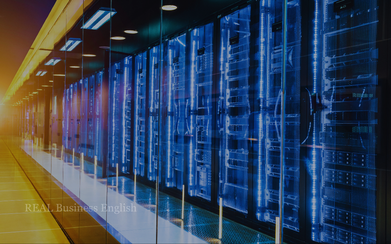 Rows of blue-lit server racks inside a modern data center.