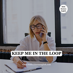 Business English phrase image with the text Keep me in the loop on a woman taking notes during a phone call.