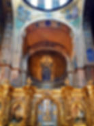 View of the Mother of God Orans mosaic with a Baroque iconostasis inside the Saint Sophia Cathedral in Kyiv, Ukraine. Photo by Rasal Hague via Wikimedia Commons (CC BY-SA 4.0).