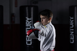 Child learning ITF Taekwondo sparring at NextGen Martial Arts after school program Burlington Ontario