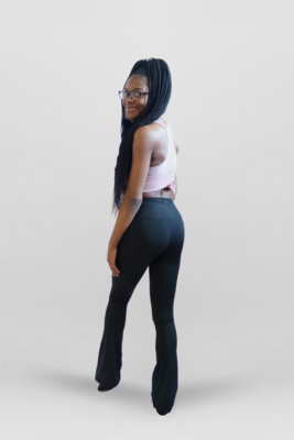 black woman in Flare Leggings smiling