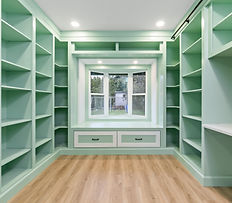 ADU Library with Bay Window and Floor to Ceiling Bookshelves