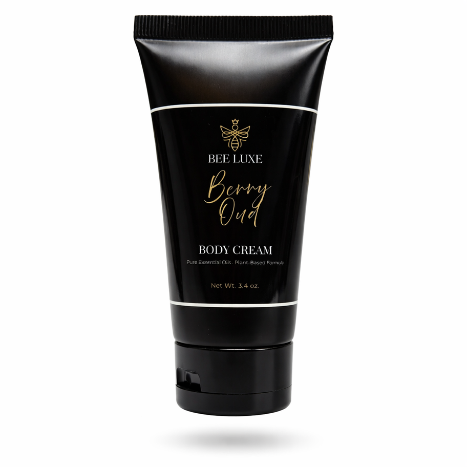 Bee Luxe Body Cream in a sleek black tube with gold detailing, featuring a plant-based formula and elegant, luxury packaging